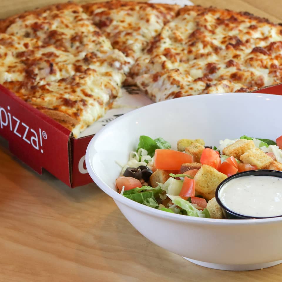Chicken bacon ranch pizza with salad from Westside pizza